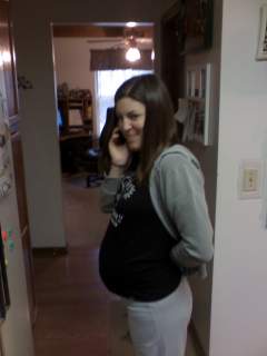 Lizard in her TROGDOR! shirt, side view