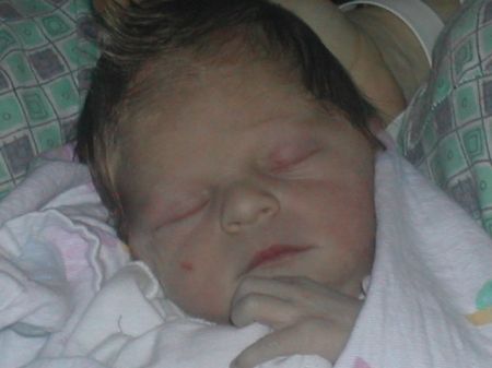Look at the cowlick. He'll be plastering that thing down for years.